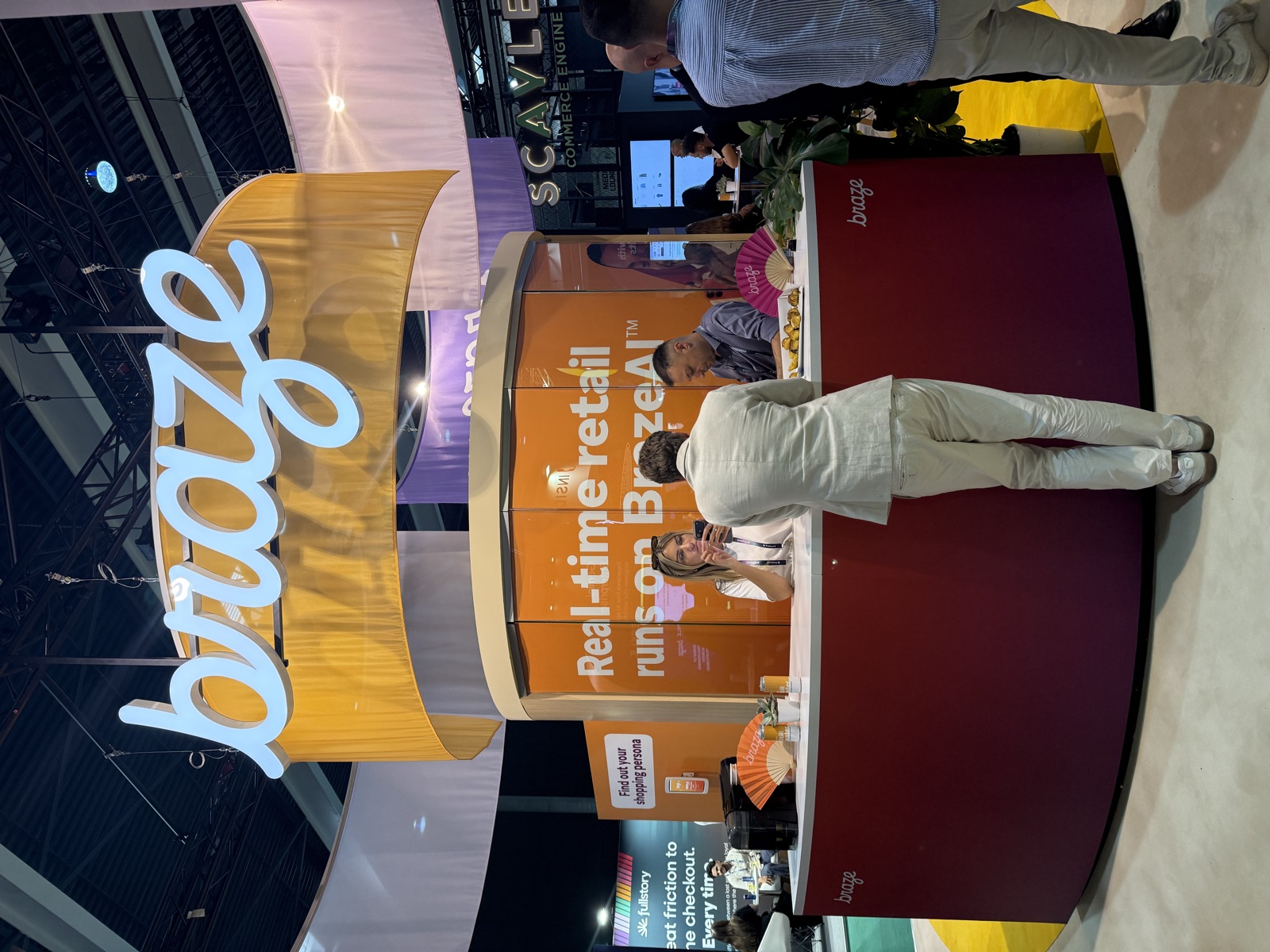 The Braze stand at Shoptalk Europe, with signage reading real-time retail runs on Braze AI